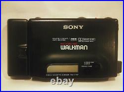 Vintage Sony Walkman WM-F707 with case & accessories for parts, NOT working